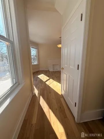 a view of a bathroom from a hallway