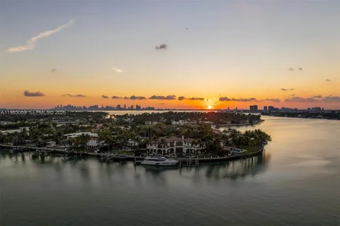 a view of a balcony with chairs