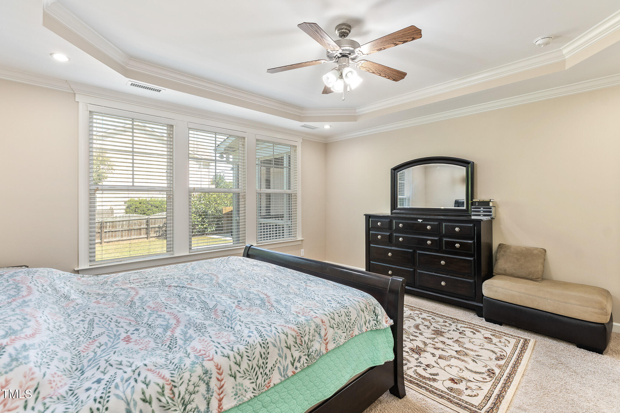 800 Chapanoke Road Raleigh, NC 27603 - Photo 15 of 39 a bedroom with a bed and a dresser
