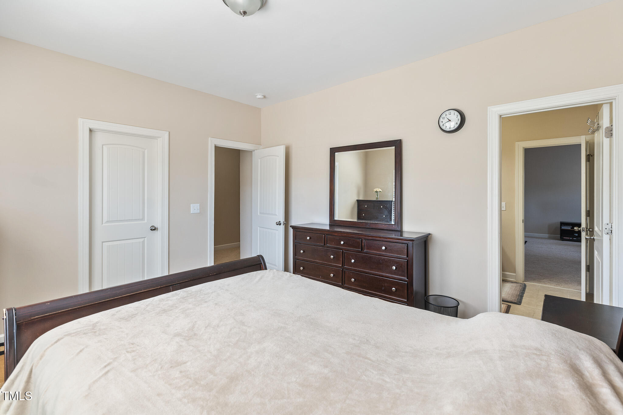800 Chapanoke Road Raleigh, NC 27603 - Photo 26 of 39 a bedroom with a bed and a dresser