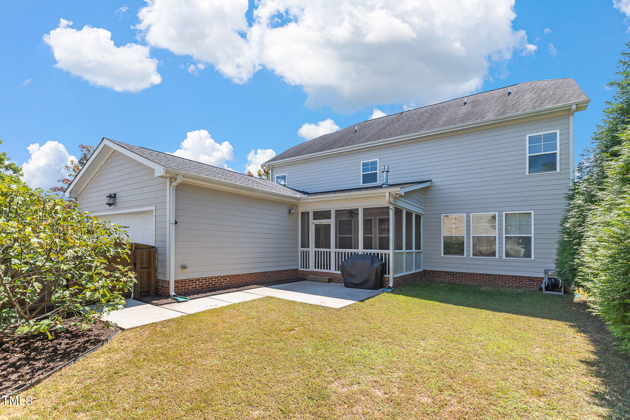 800 Chapanoke Road Raleigh, NC 27603 - Photo 34 of 39 a view of a house with a yard and potted plants