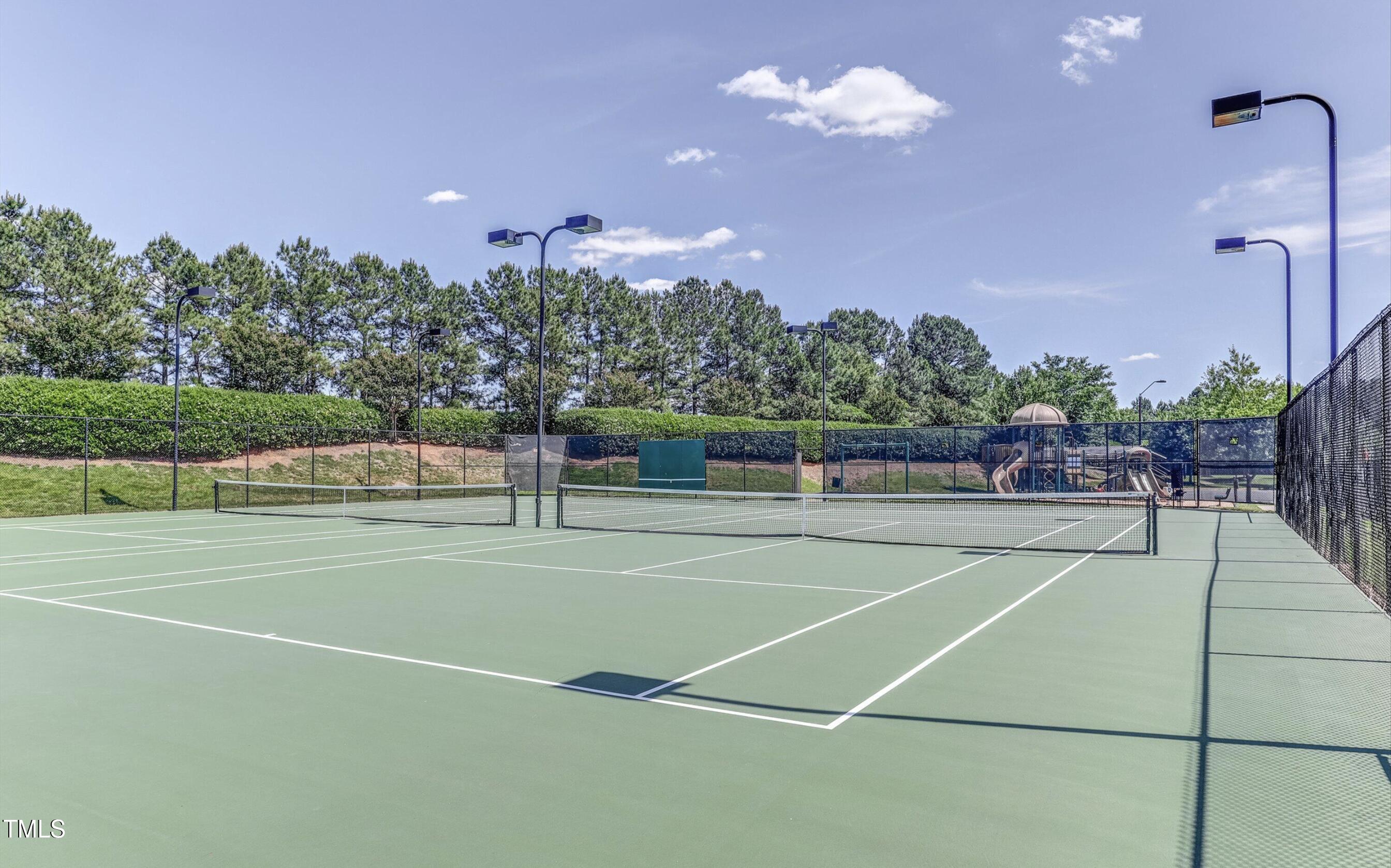 800 Chapanoke Road Raleigh, NC 27603 - Photo 38 of 39 a view of a tennis court