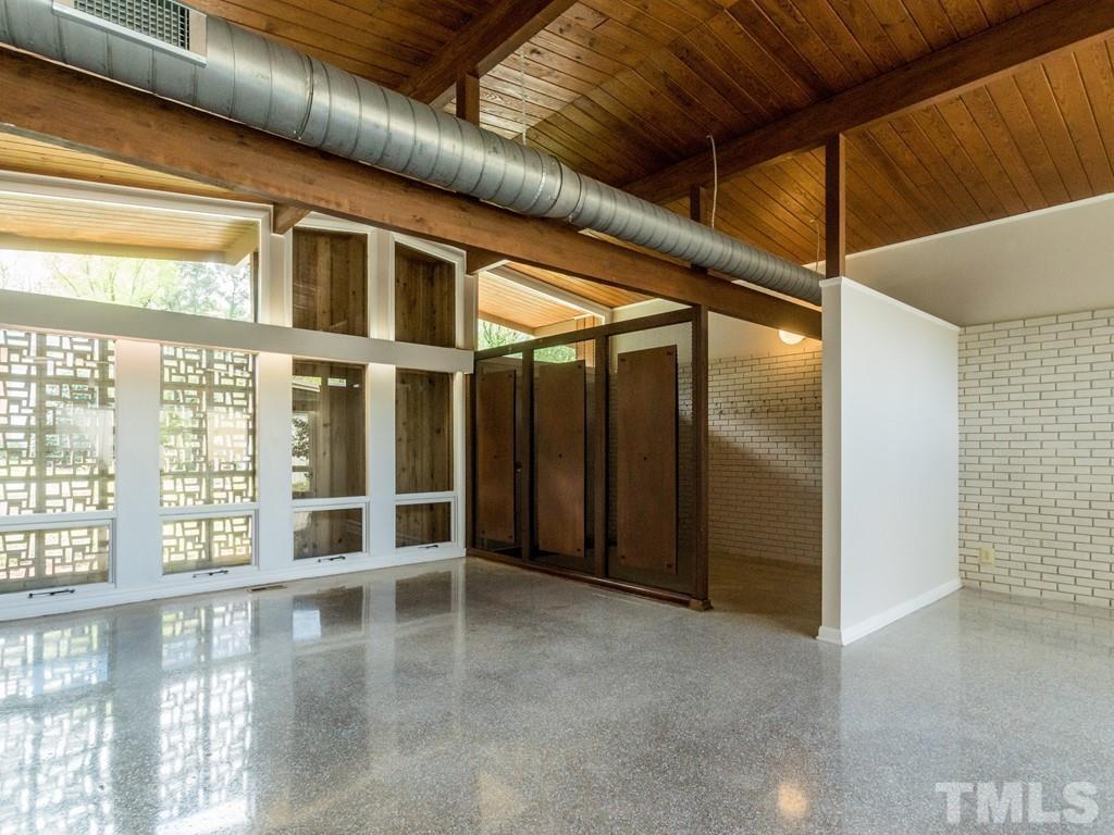 3612 Anclote Place Raleigh, NC 27607 - Photo 5 of 25 a view of an empty room with a window