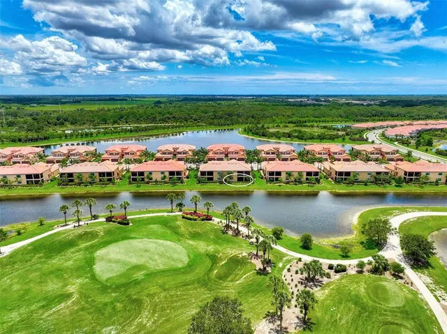 a view of a dining area with furniture and wooden floor