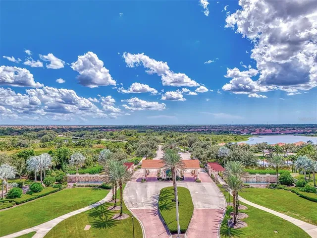 a view of a golf course with a lake