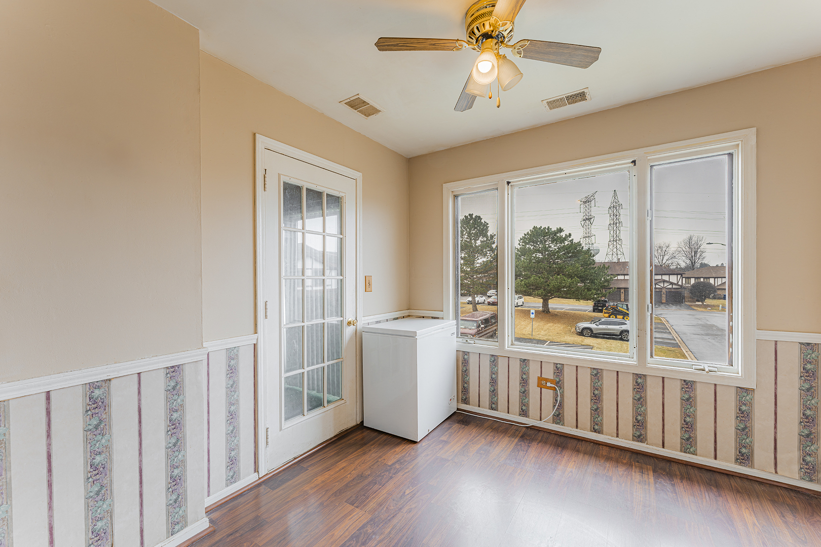 9724 West Creek Road, Unit B2 Palos Park, IL 60464 - Photo 9 of 22 a large room with wooden floor and windows
