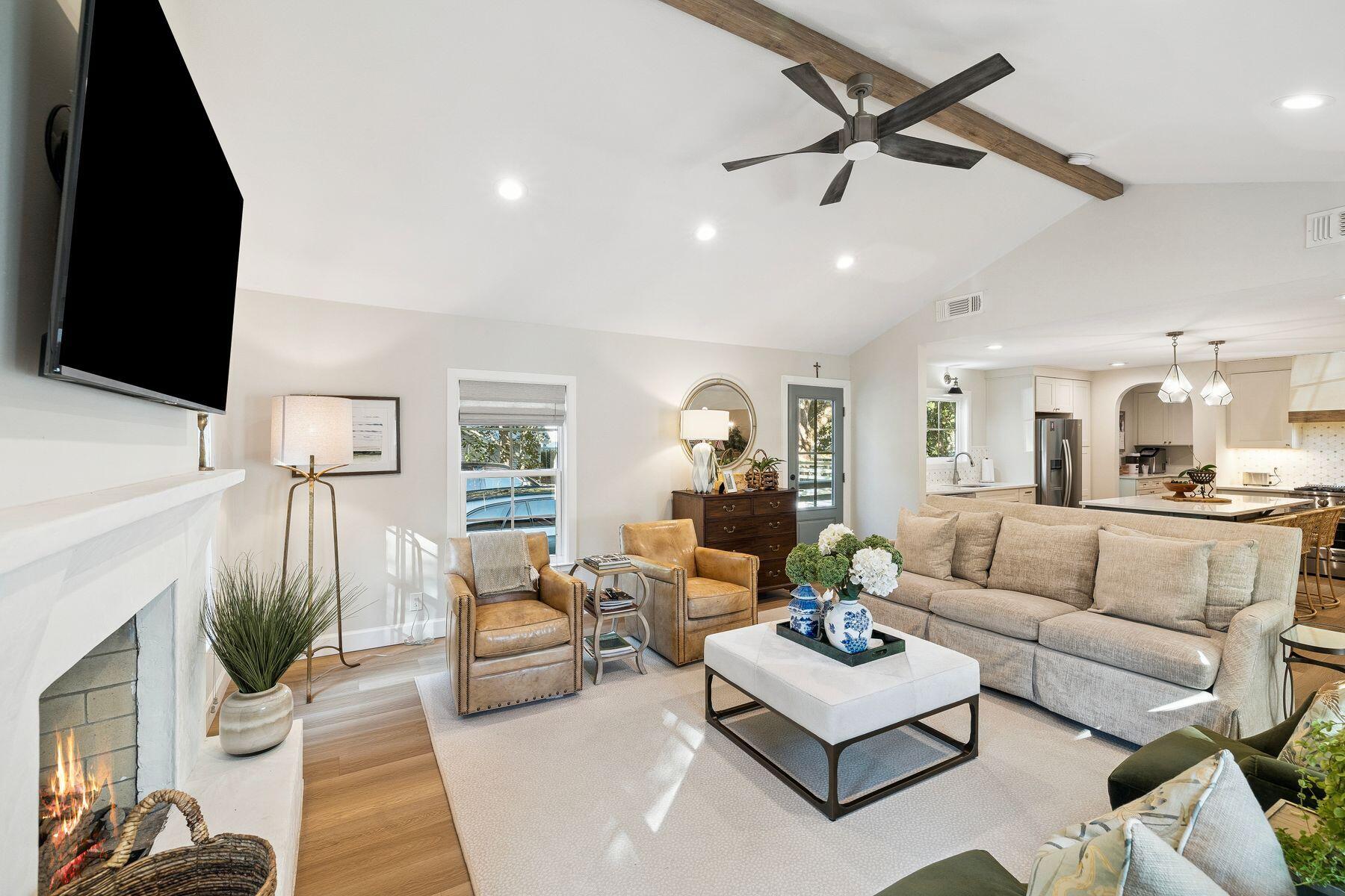 1525 West Hewett Road Santa Rosa Beach, FL 32459 - Photo 11 of 56 a living room with furniture and a flat screen tv