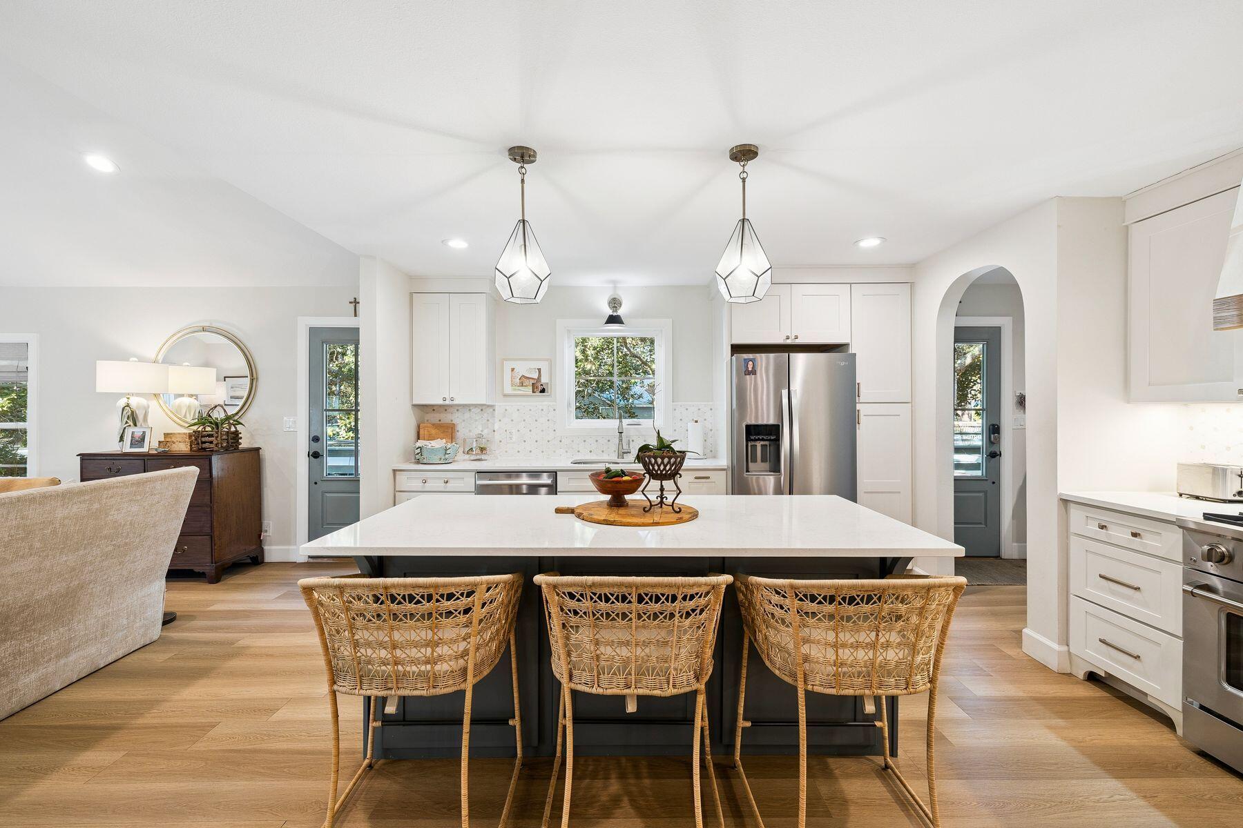 1525 West Hewett Road Santa Rosa Beach, FL 32459 - Photo 12 of 56 a view of a dining room with furniture and wooden floor