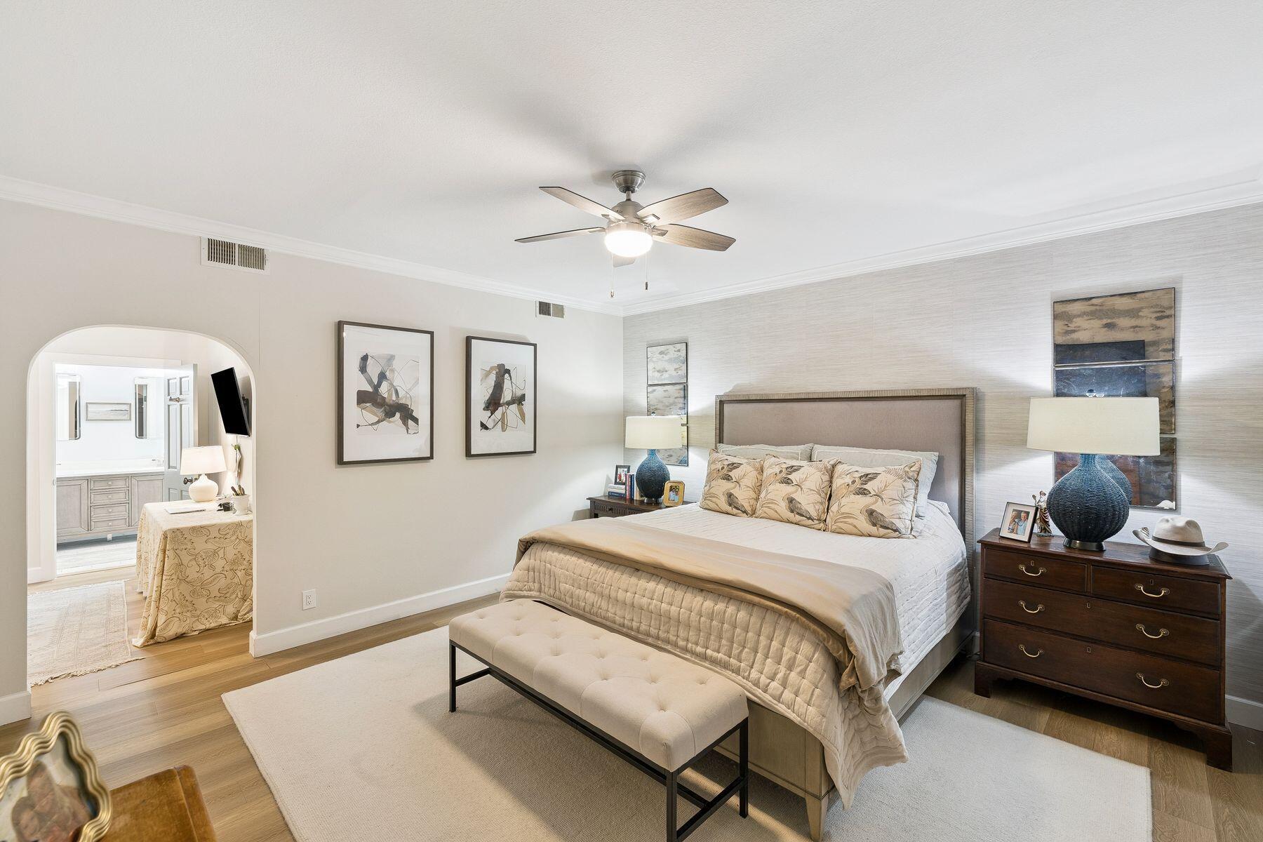 1525 West Hewett Road Santa Rosa Beach, FL 32459 - Photo 20 of 56 a bedroom with a bed and wooden floor