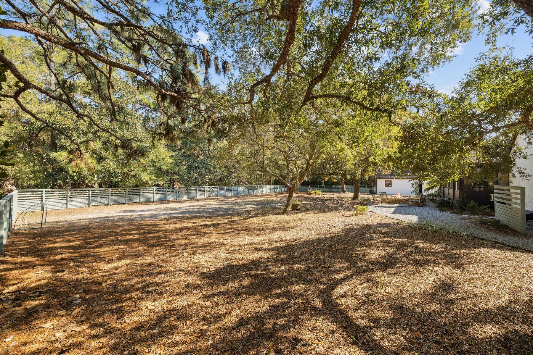 1525 West Hewett Road Santa Rosa Beach, FL 32459 - Photo 44 of 56 a view of yard with trees