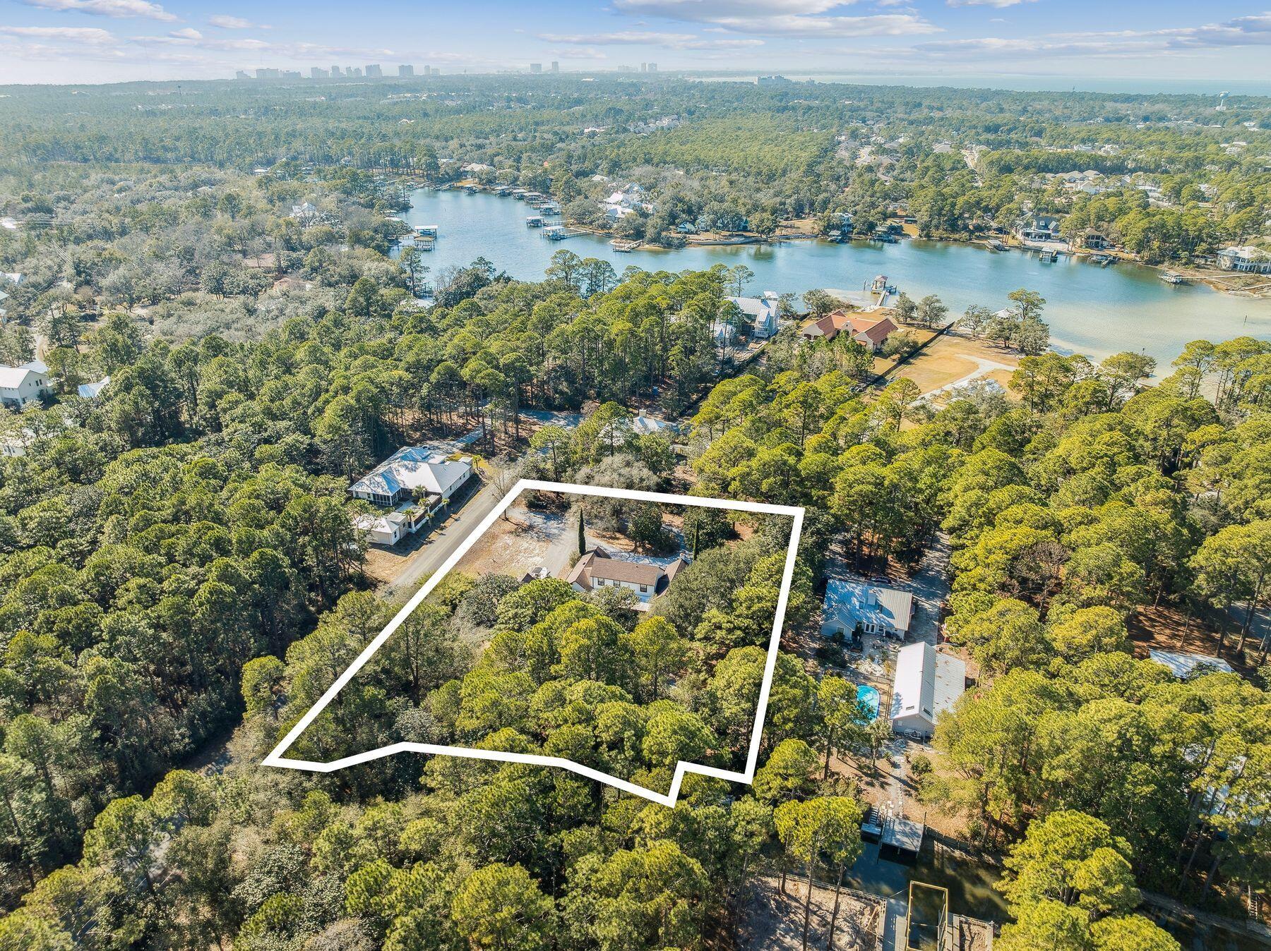 1525 West Hewett Road Santa Rosa Beach, FL 32459 - Photo 50 of 56 a view of a lake with a mountain