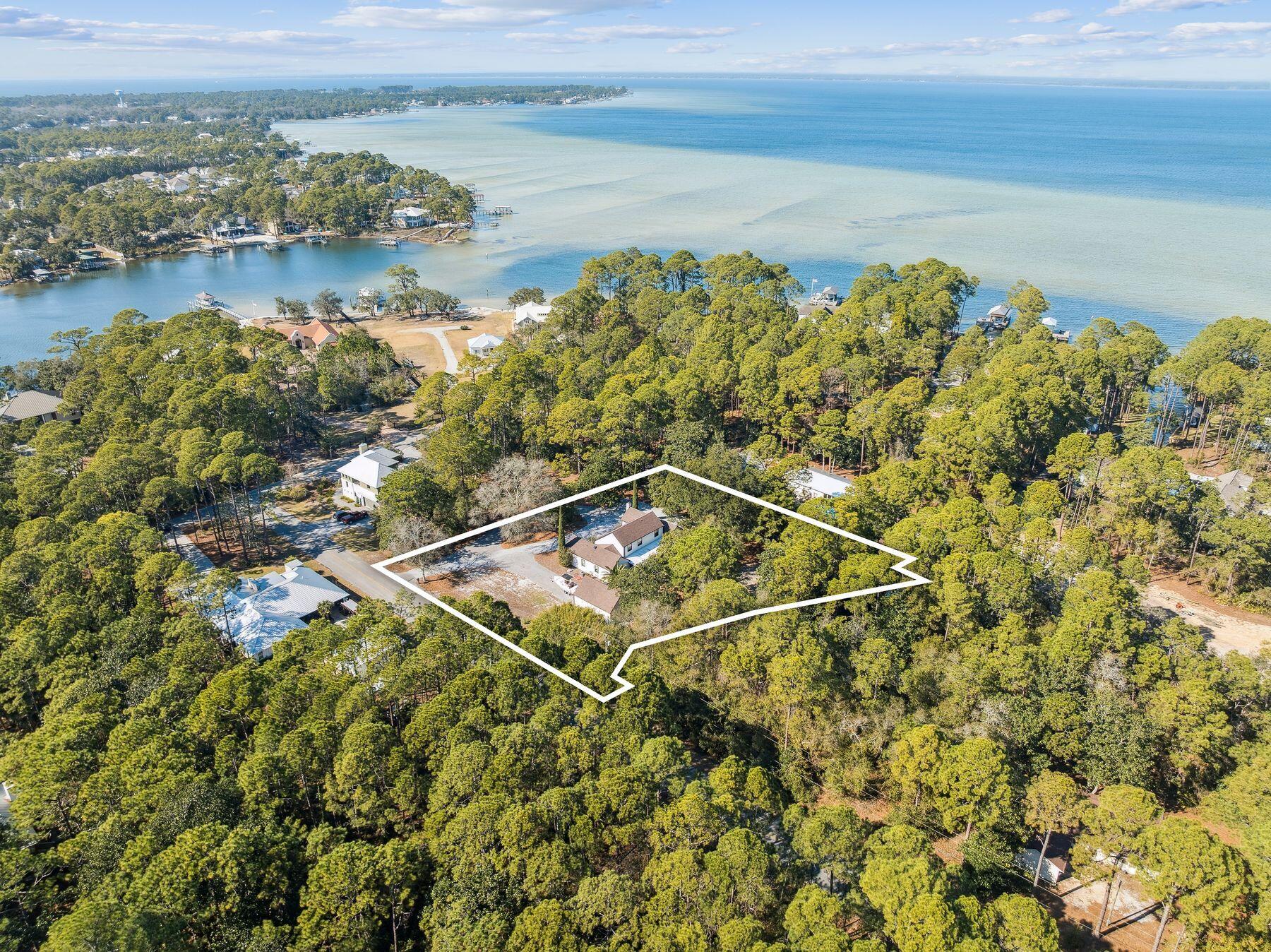 1525 West Hewett Road Santa Rosa Beach, FL 32459 - Photo 5 of 56 a view of a lake