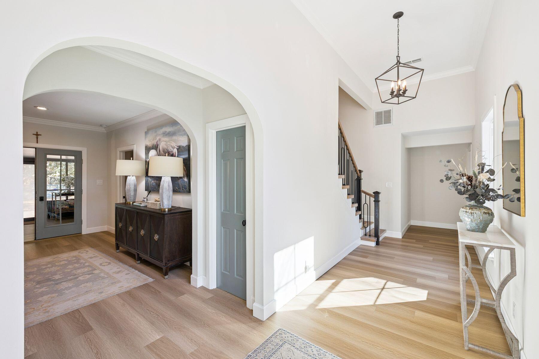 1525 West Hewett Road Santa Rosa Beach, FL 32459 - Photo 6 of 56 a view of a livingroom with furniture and entryway