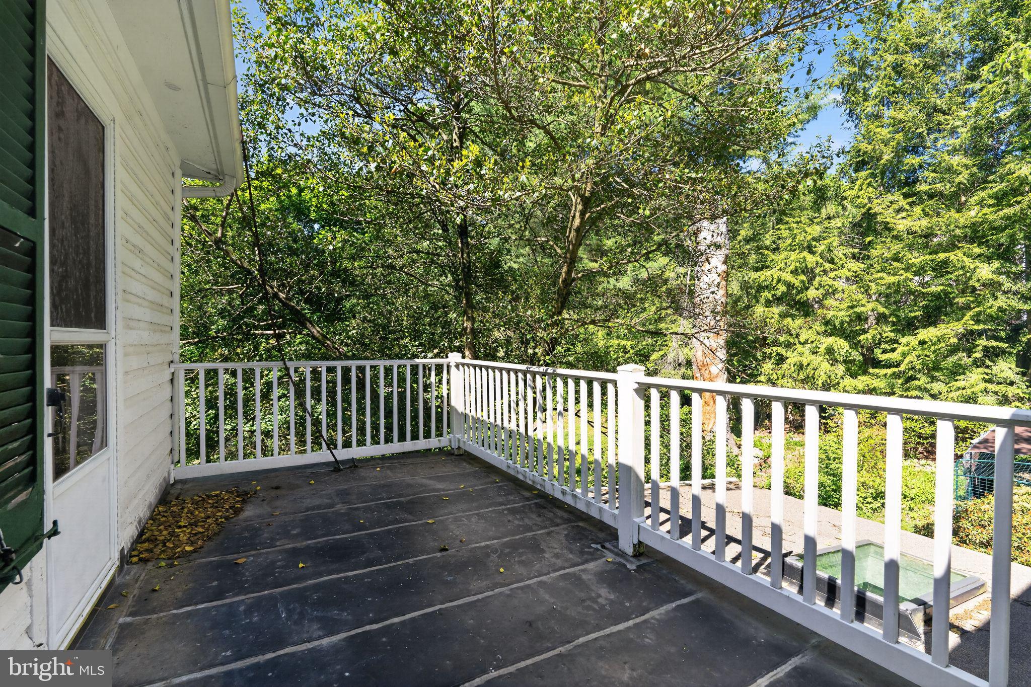 12000 Bethesda Church Road Damascus, MD 20872 - Photo 35 of 59 Porch above sunroom overlooking the trees