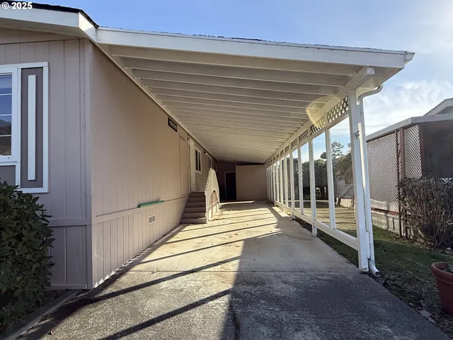 a view of a porch with furniture