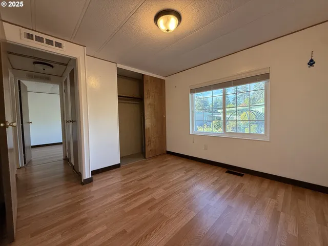a bathroom with a toilet sink and shower