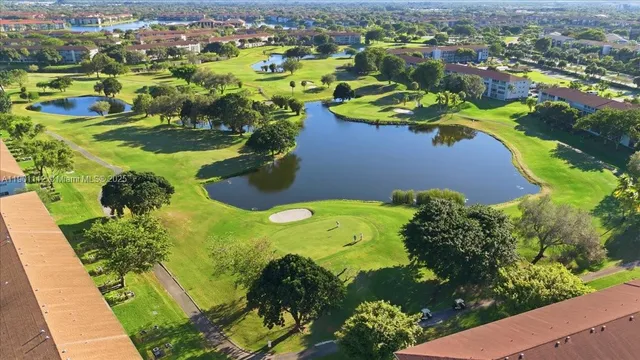 a view of a swimming pool with a garden