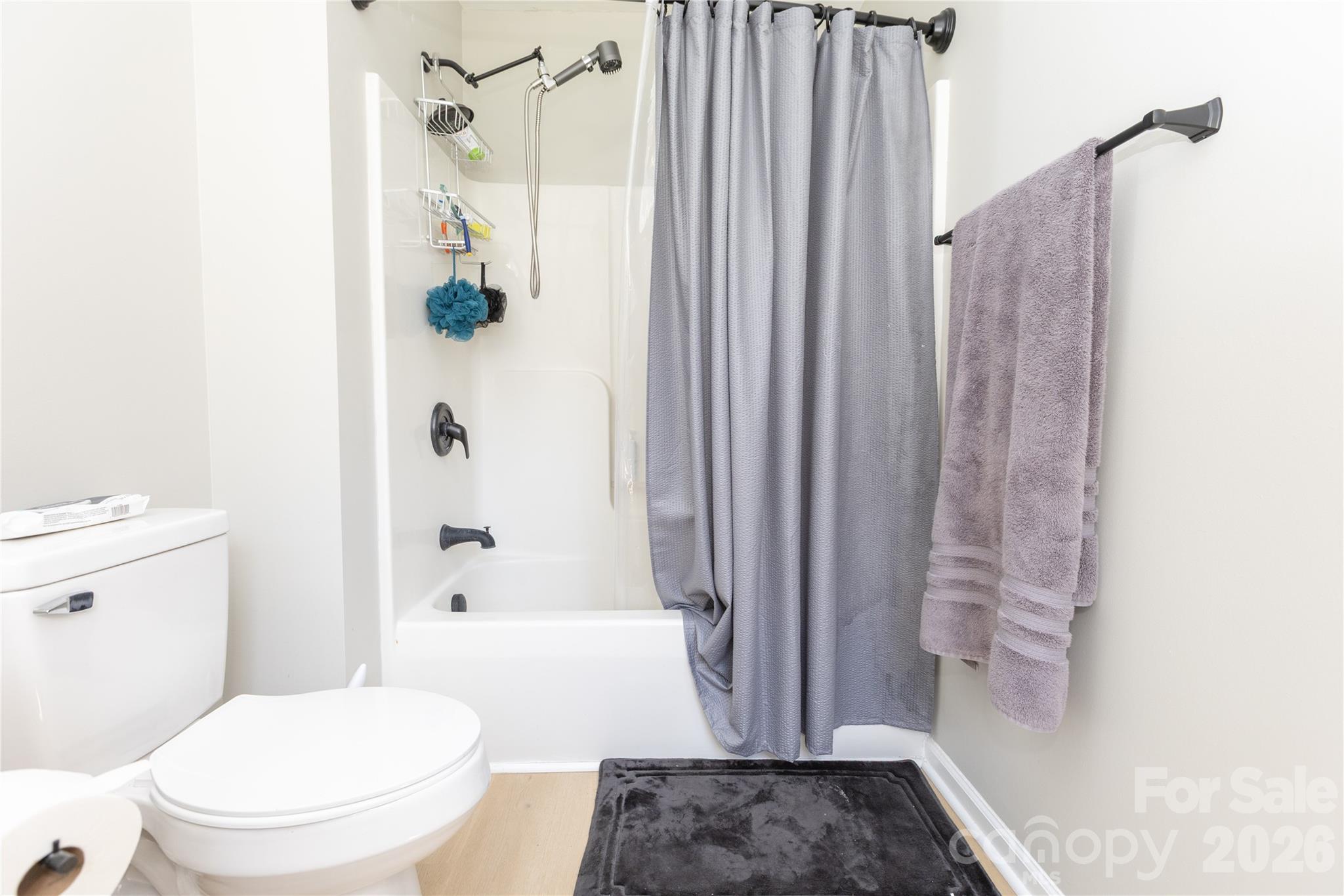 5126 Monroe-Ansonville Road Wingate, NC 28174 - Photo 20 of 28 a bathroom with a bathtub and shower