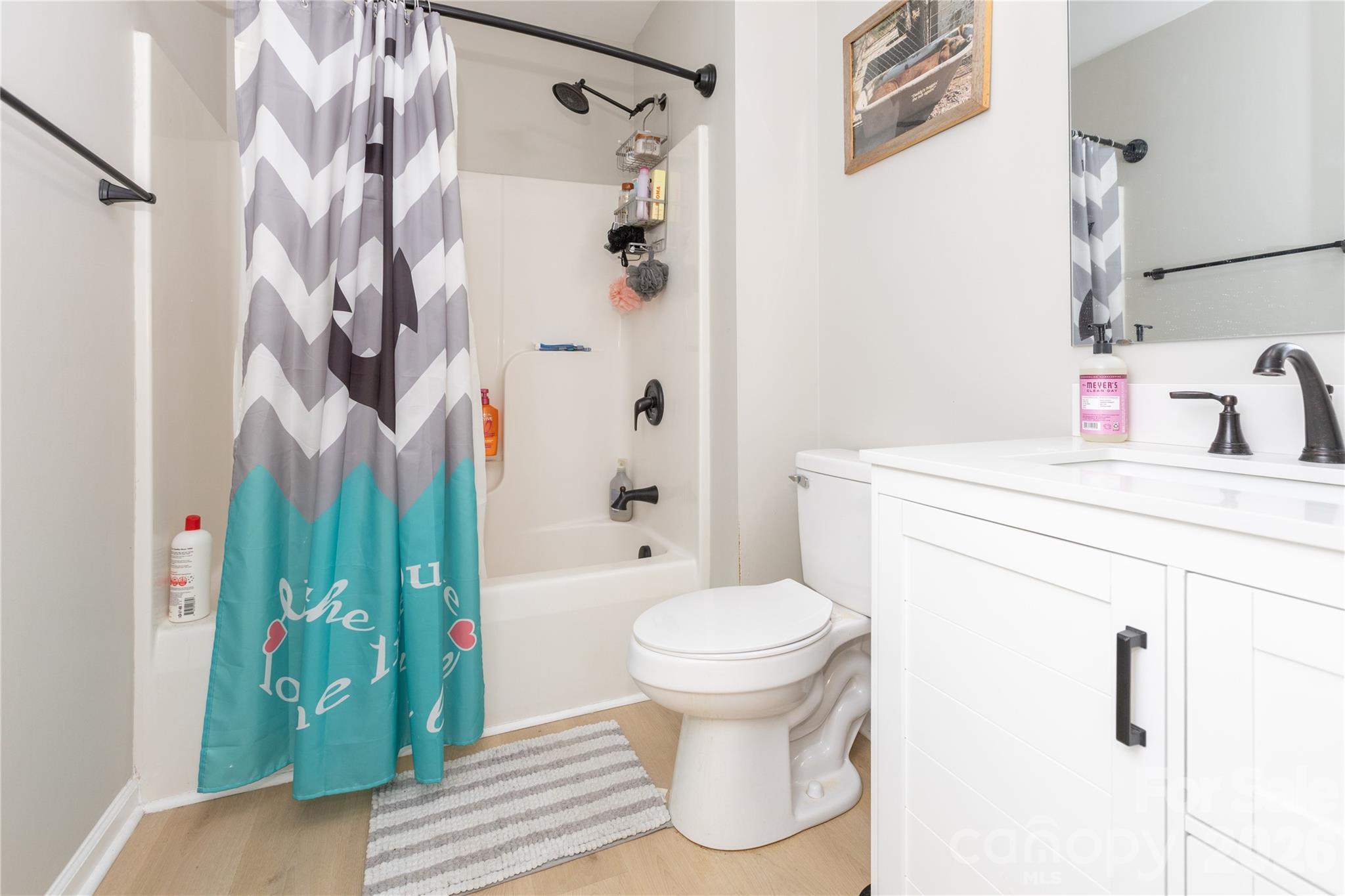 5126 Monroe-Ansonville Road Wingate, NC 28174 - Photo 25 of 28 a bathroom with a sink and a toilet