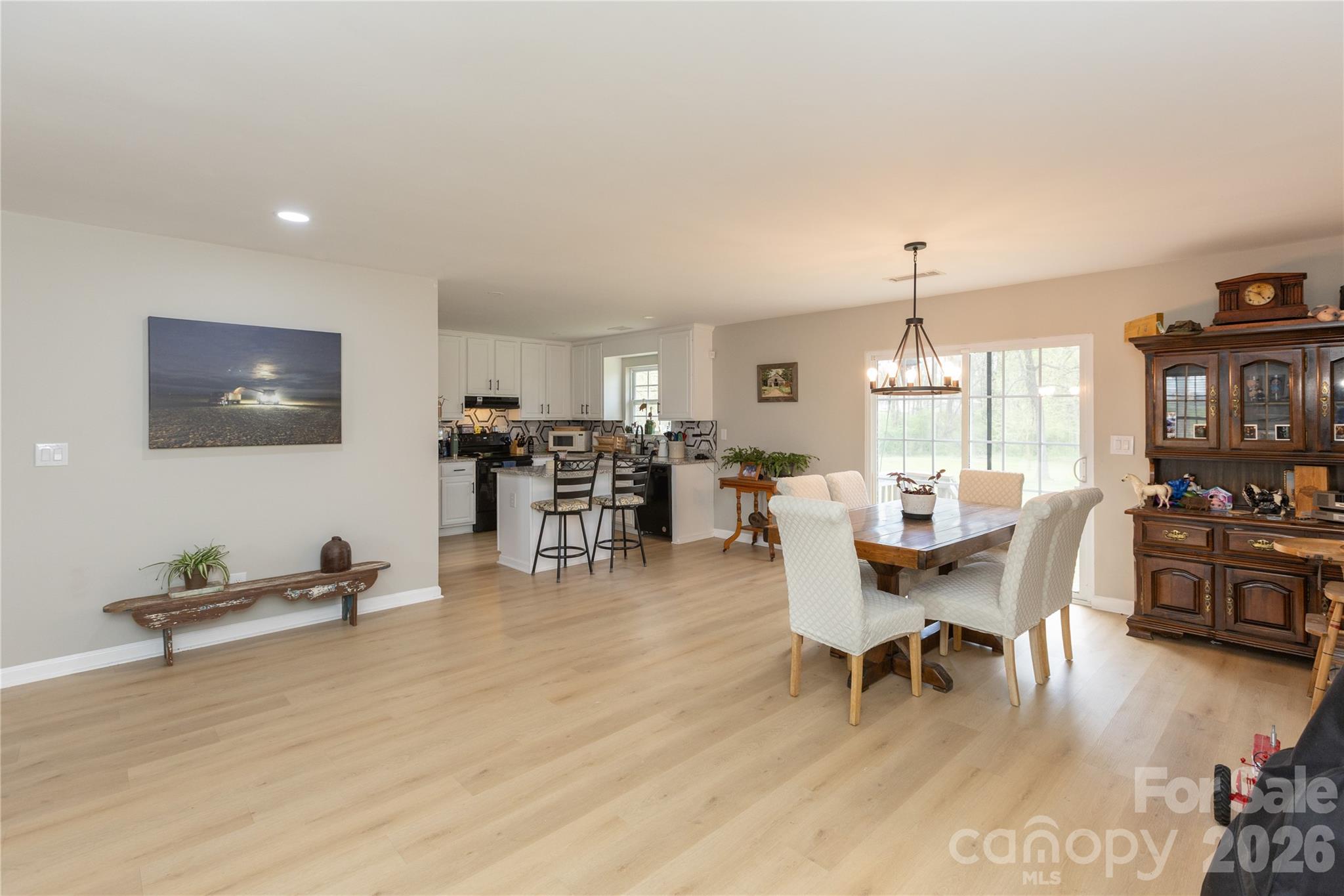5126 Monroe-Ansonville Road Wingate, NC 28174 - Photo 10 of 28 a living room with furniture and wooden floor