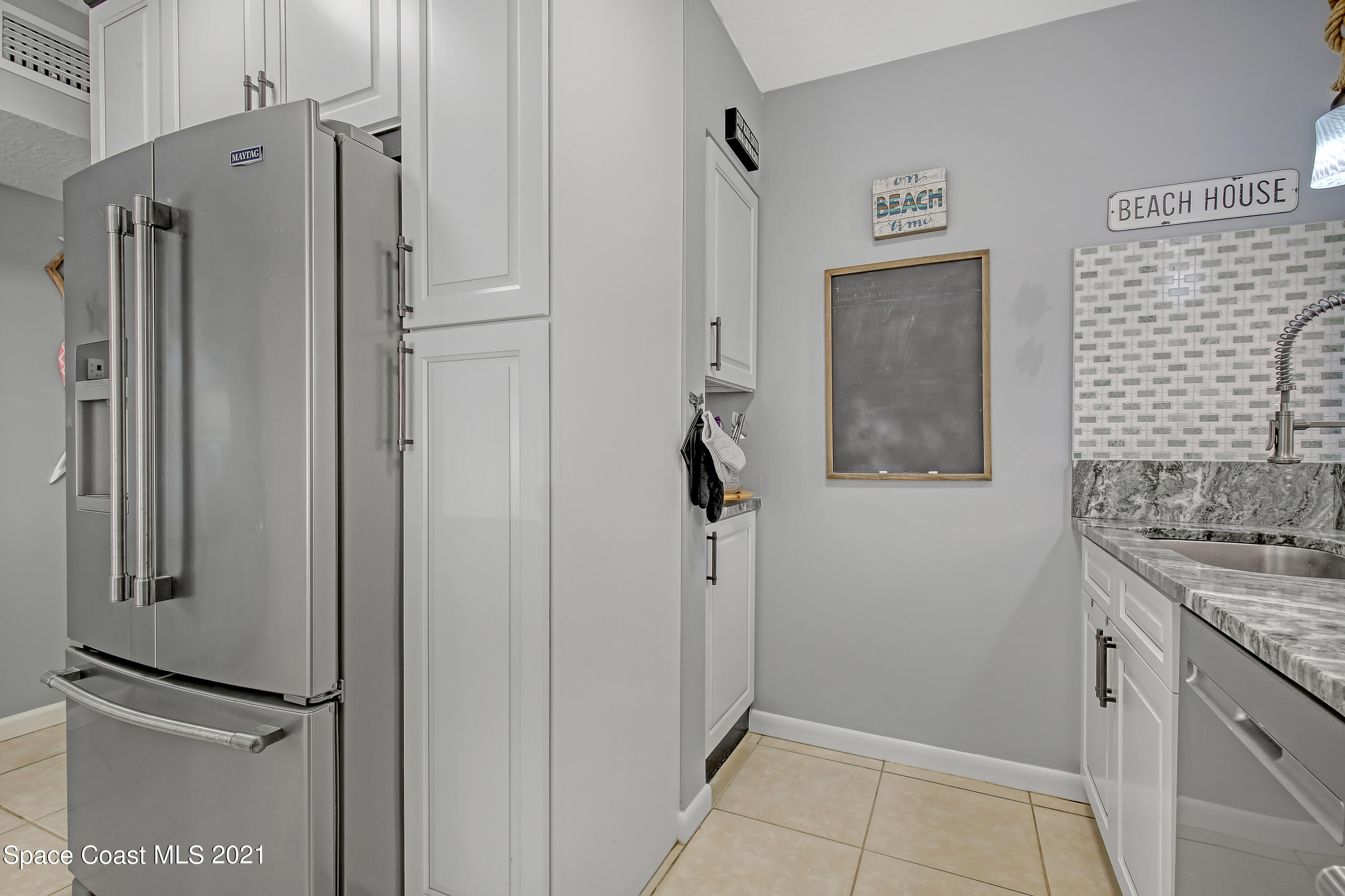 5000 Ocean Beach Boulevard, Unit C5 Cocoa Beach, FL 32931 - Photo 15 of 43 a bathroom with a shower and a sink