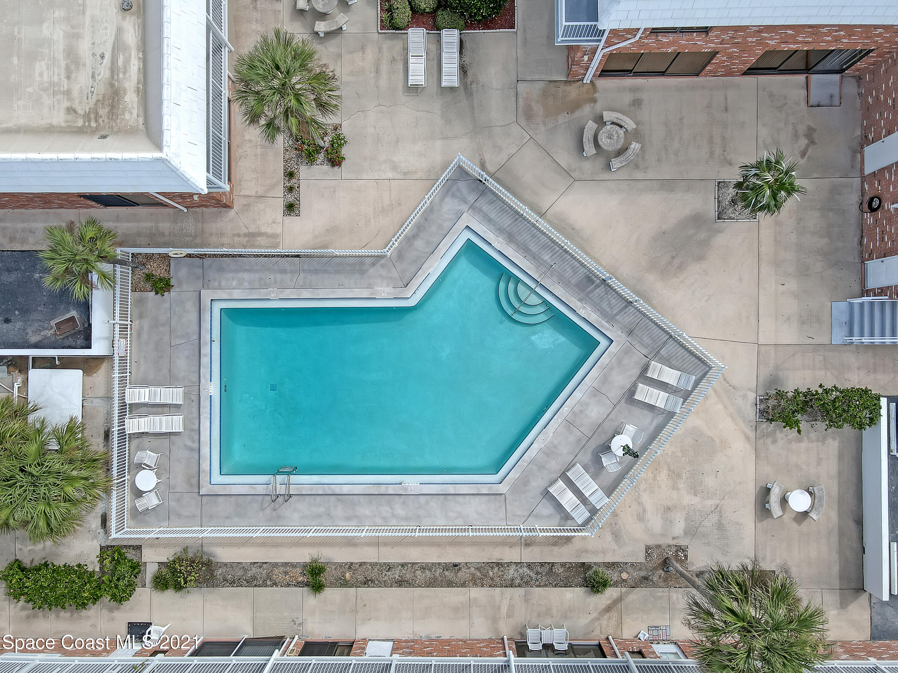 5000 Ocean Beach Boulevard, Unit C5 Cocoa Beach, FL 32931 - Photo 31 of 43 a view of outdoor space and yard