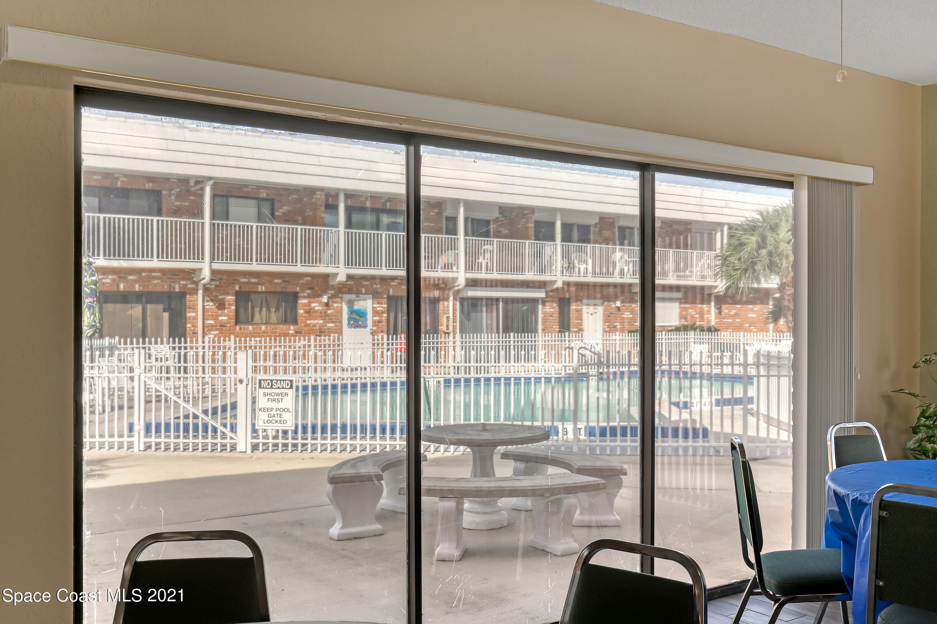 5000 Ocean Beach Boulevard, Unit C5 Cocoa Beach, FL 32931 - Photo 34 of 43 a view of a room with windows