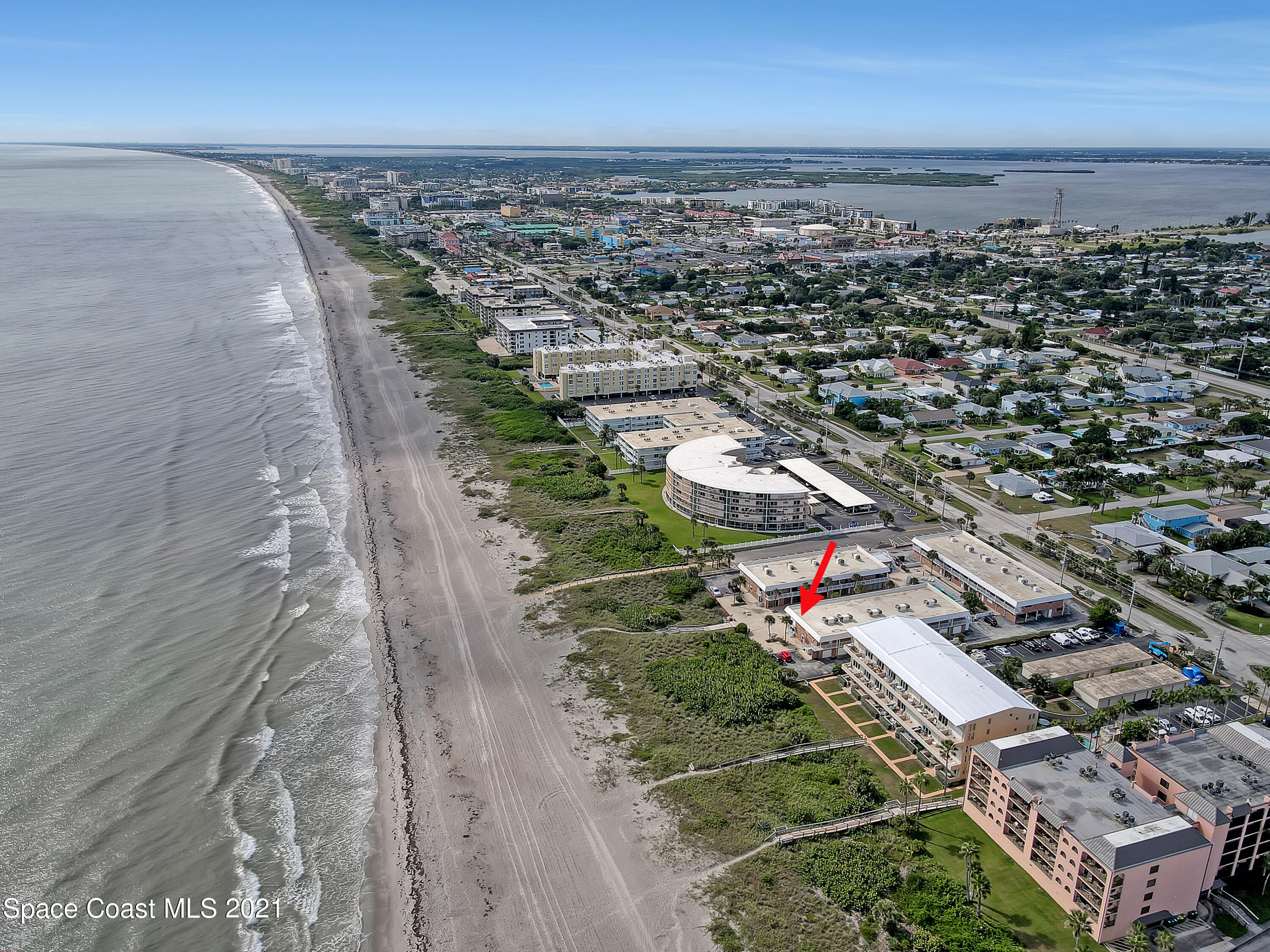 5000 Ocean Beach Boulevard, Unit C5 Cocoa Beach, FL 32931 - Photo 41 of 43 an aerial view of a houses