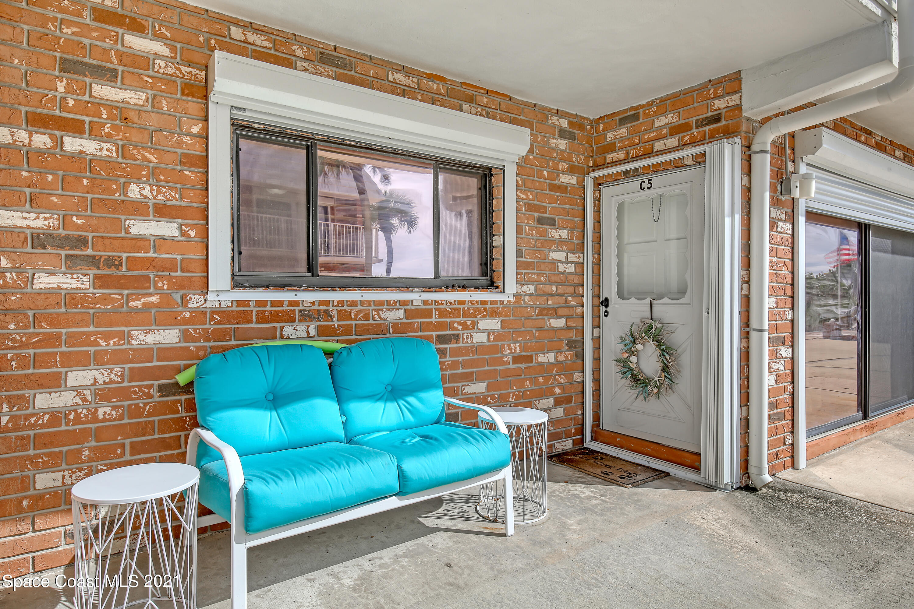 5000 Ocean Beach Boulevard, Unit C5 Cocoa Beach, FL 32931 - Photo 7 of 43 a view of front door of house