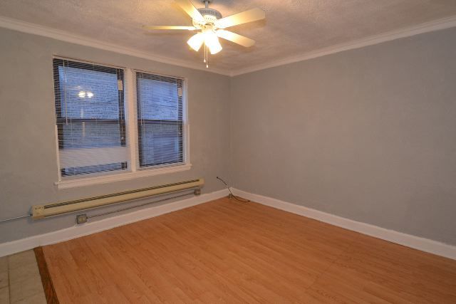 4735 North Beacon Street, Unit 307 Chicago, IL 60640 - Photo 9 of 15 a view of empty room with window