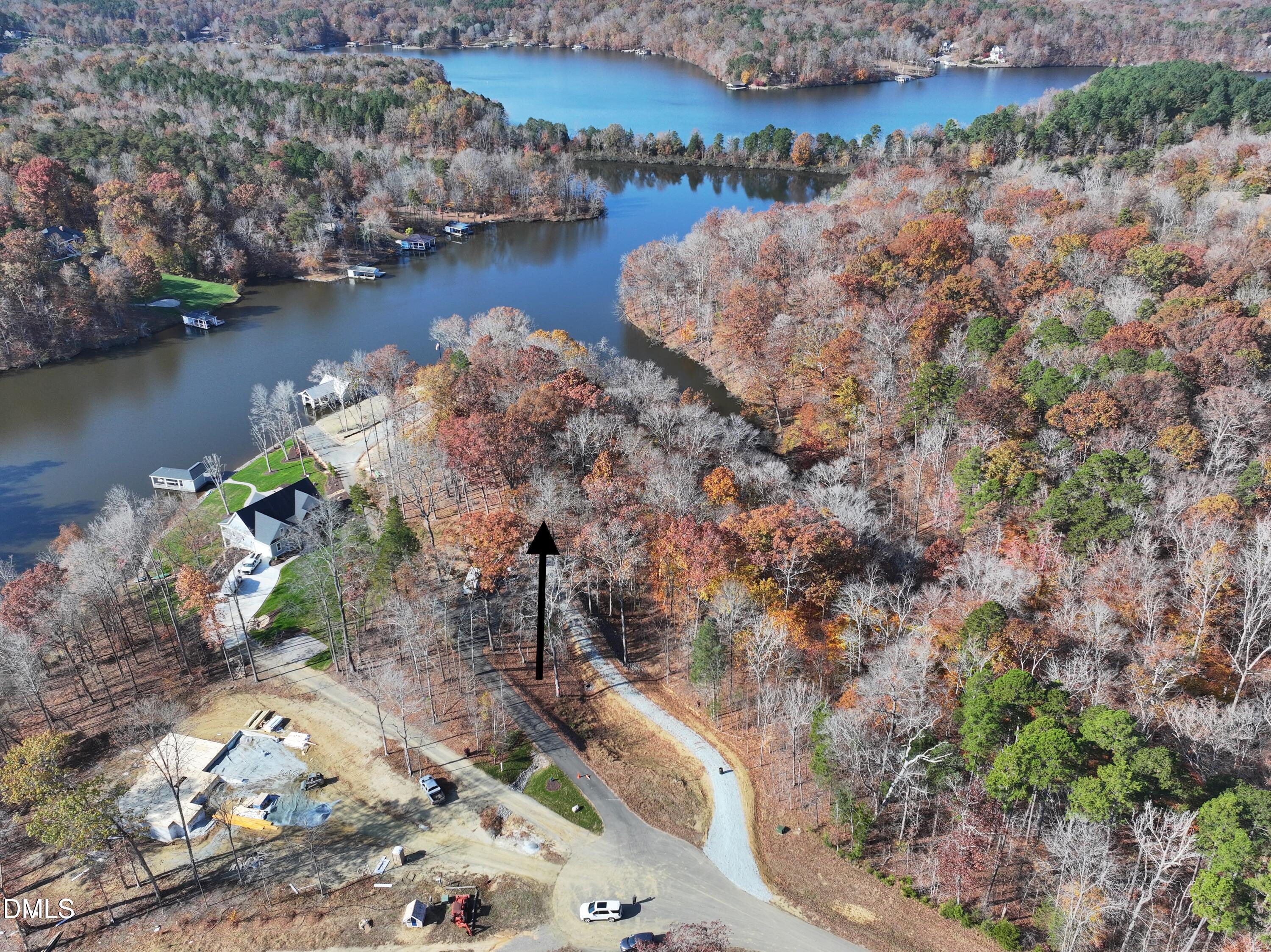 34 Summer Oak Drive Roxboro, NC 27574 - Photo 5 of 10 a view of a lake with large trees