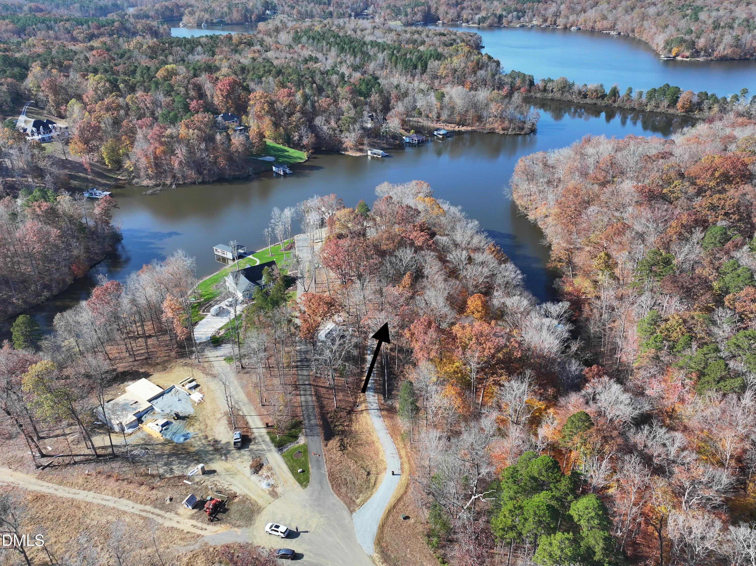 34 Summer Oak Drive Roxboro, NC 27574 - Photo 6 of 10 an aerial view of a house with a yard and lake view