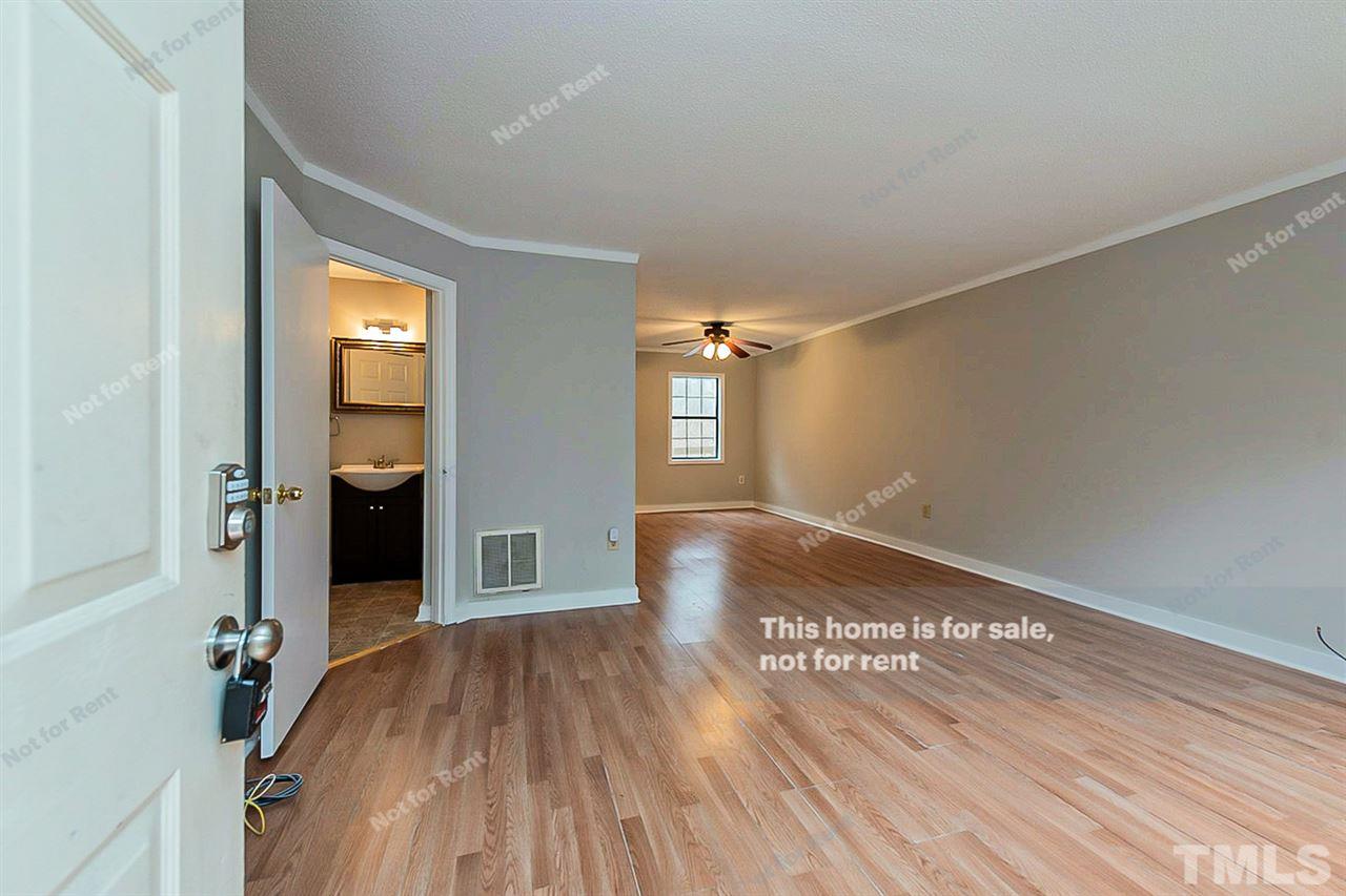 3622 Colchester Street, Unit 26 Durham, NC 27707 - Photo 9 of 16 a view of empty room with wooden floor