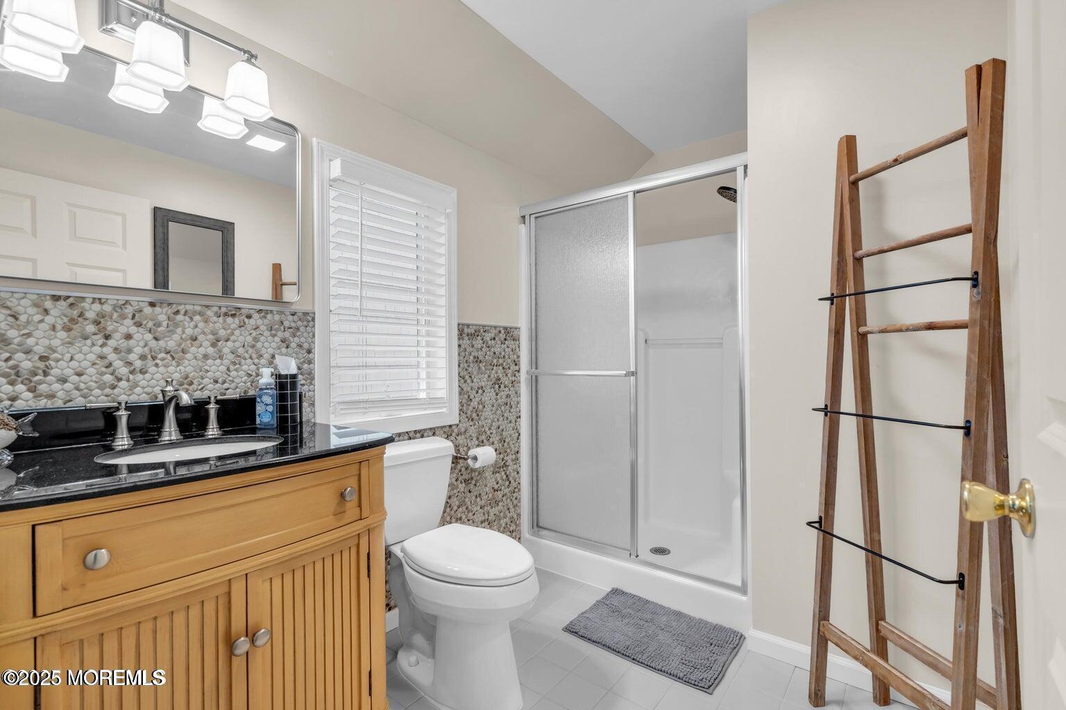 520 Brighton Avenue Spring Lake, NJ 07762 - Photo 16 of 25 a bathroom with a sink a toilet and shower