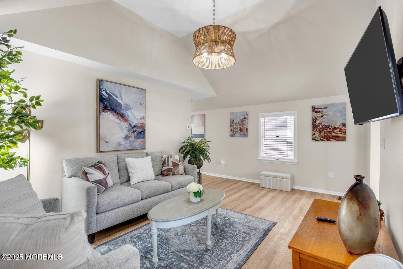 520 Brighton Avenue Spring Lake, NJ 07762 - Photo 6 of 25 a living room with furniture and a flat screen tv