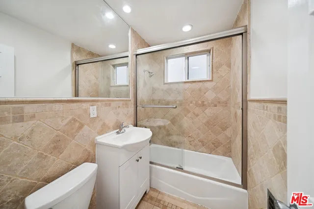 a bathroom with a sink and a bathtub
