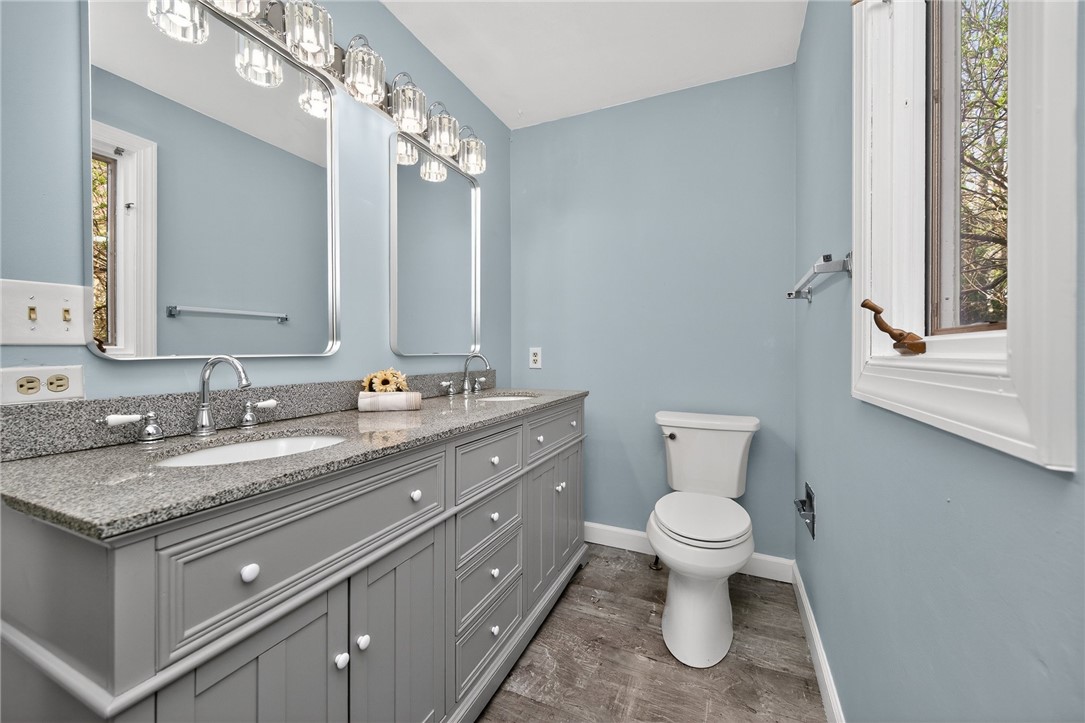4747 Fawnwood Road Dayton, OH 45429 - Photo 30 of 58 This bathroom features a double vanity and sleek fixtures, offering both style and practicality.