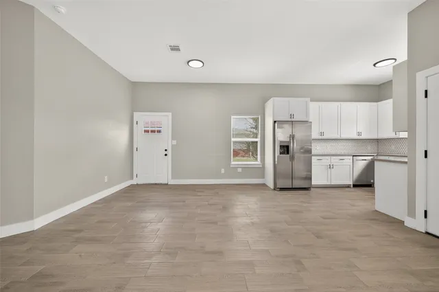 a view of a kitchen with a sink