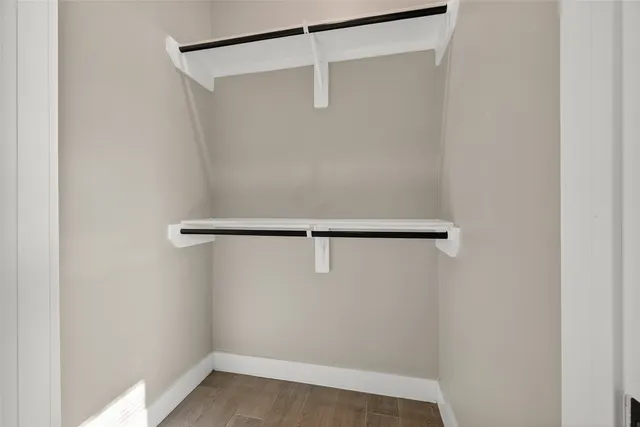 a view of a room with racks on the wall