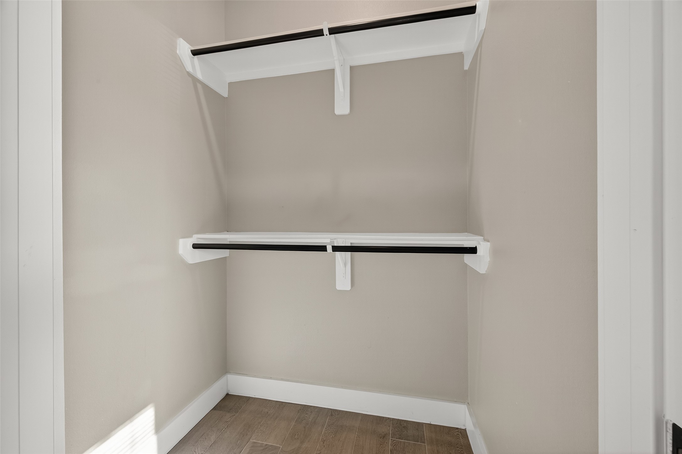 8005 Sexton Street, Unit B Houston, TX 77028 - Photo 25 of 43 a view of a room with racks on the wall