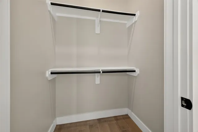 a view of small space with wooden floor