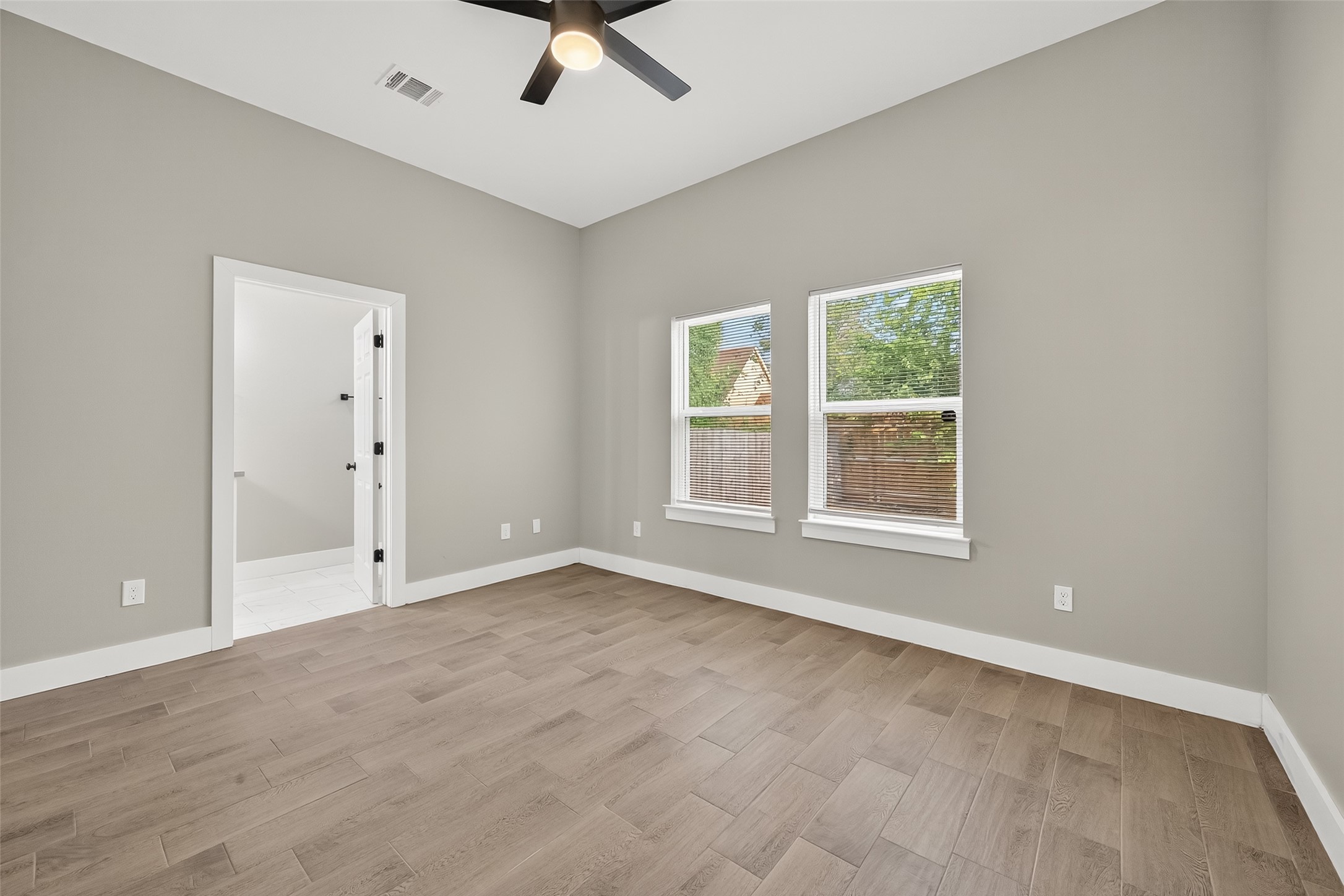 8005 Sexton Street, Unit B Houston, TX 77028 - Photo 32 of 43 a view of an empty room with a window