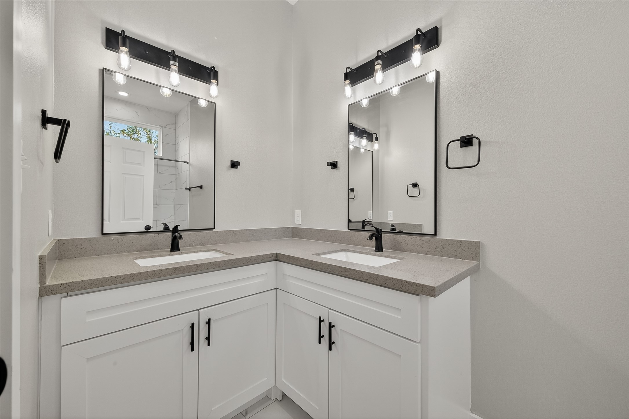 8005 Sexton Street, Unit B Houston, TX 77028 - Photo 35 of 43 a bathroom with a sink and a mirror