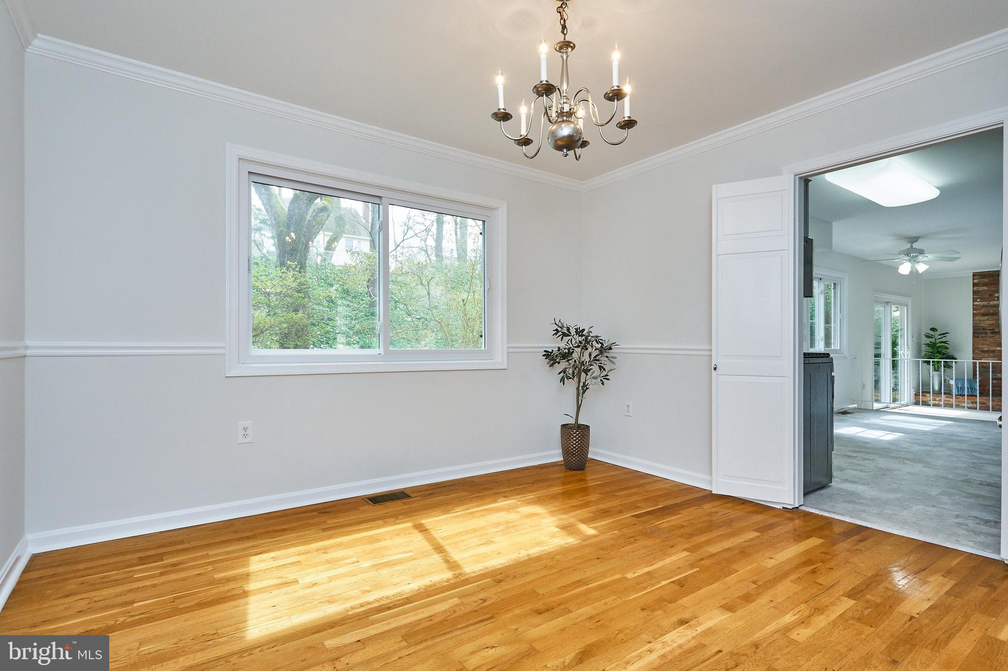 9523 Stevebrook Road Fairfax, VA 22032 - Photo 12 of 40 Dining Room with Crown and Chair Rail Molding
