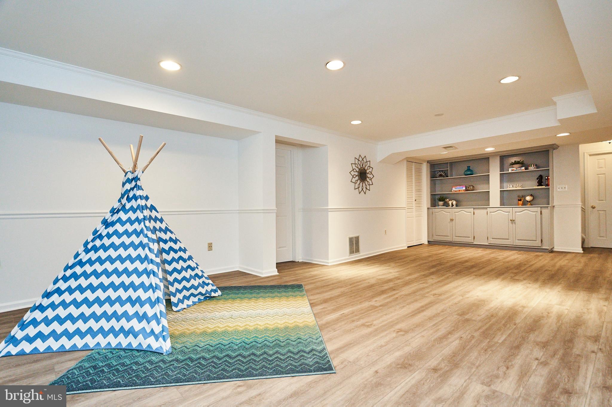 9523 Stevebrook Road Fairfax, VA 22032 - Photo 24 of 40 Large Recreation Room with New Flooring
