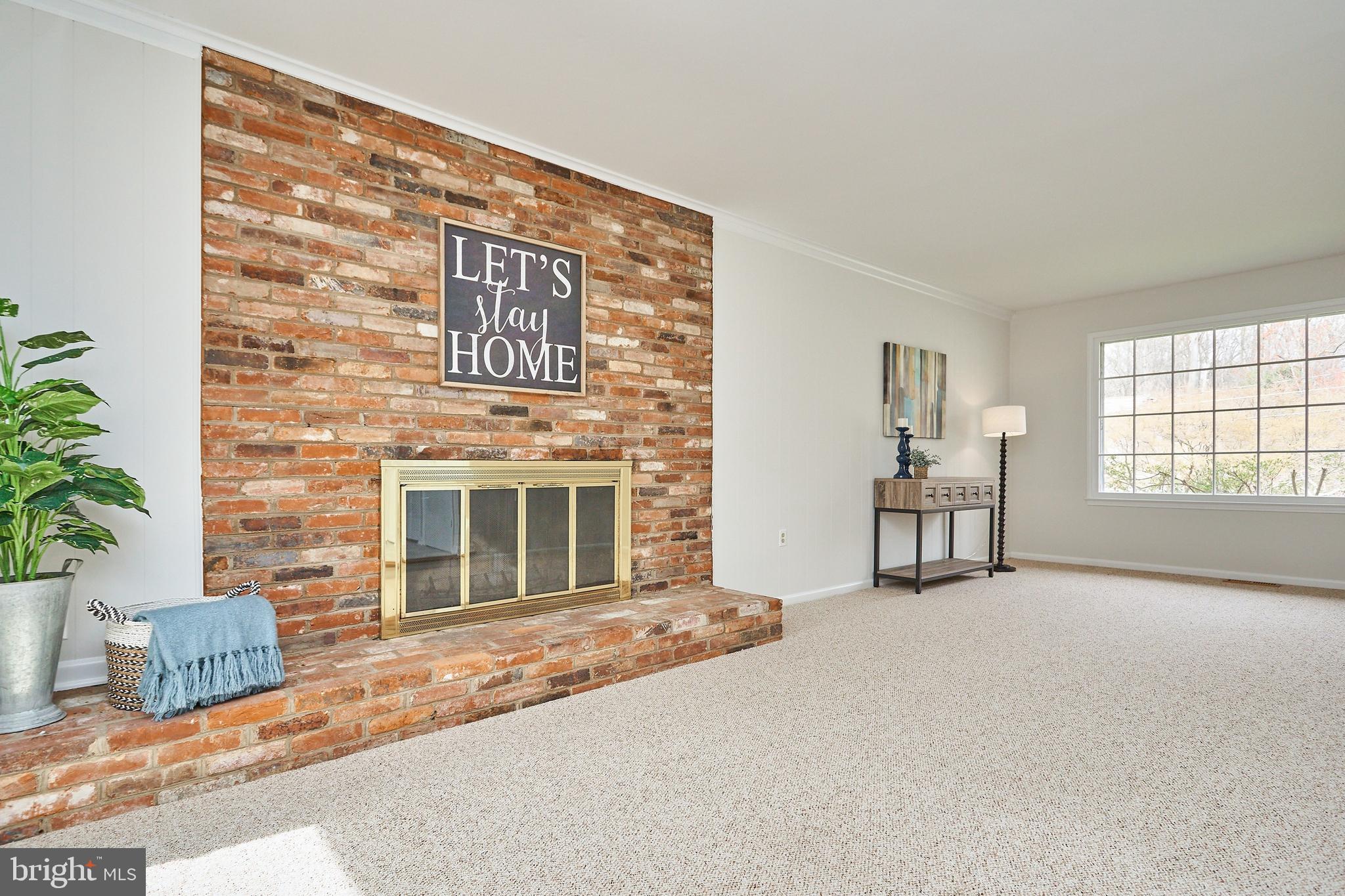 9523 Stevebrook Road Fairfax, VA 22032 - Photo 4 of 40 Family Room with Brick Fireplace