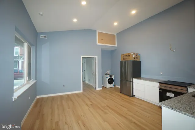 a view of a livingroom with a furniture