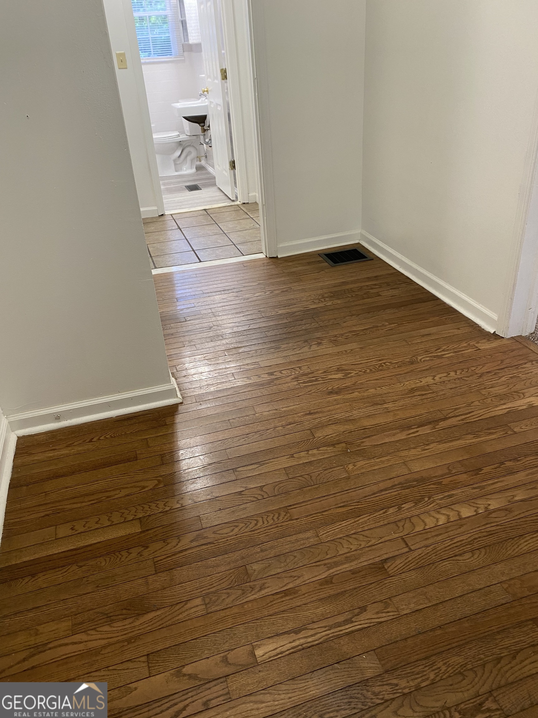 164 Glenn Carrie Road Hull, GA 30646 - Photo 20 of 43 a view of a room with wooden floor