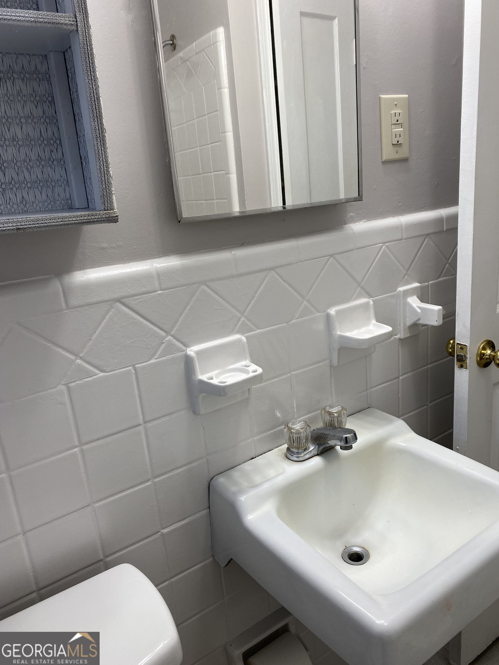 164 Glenn Carrie Road Hull, GA 30646 - Photo 25 of 43 a bathroom with a sink and a toilet