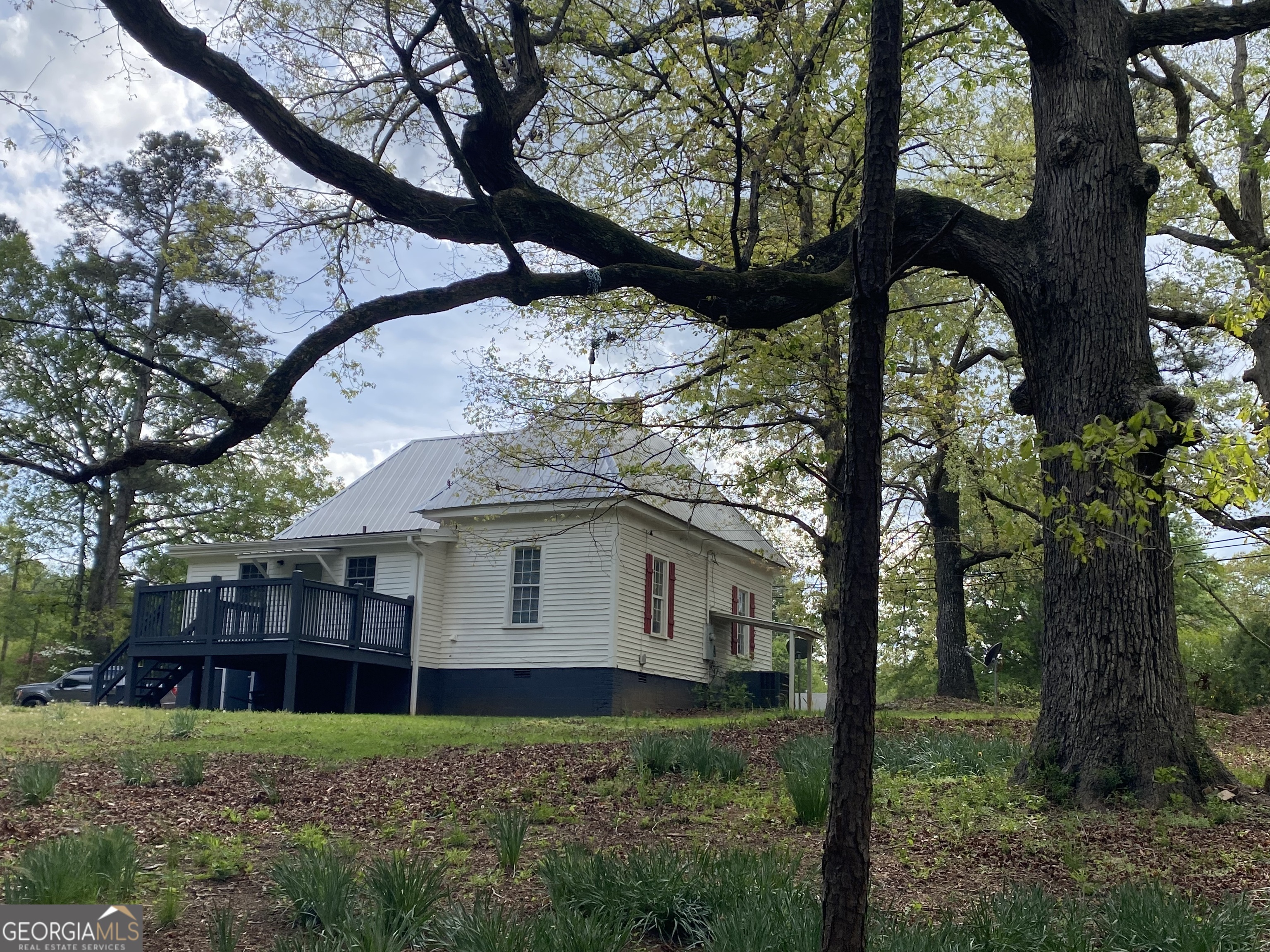 164 Glenn Carrie Road Hull, GA 30646 - Photo 32 of 43 a view of a house with a tree in the yard